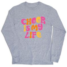 With its bright colors and 60's-inspired flower power font, this long sleeve will be a hit whenever you wear it. It's a great gift idea for anyone who just can't get enough of that cheering lifestyle. Our long sleeve tees feature superior softness and a relaxed, unisex fit making them a great go to shirt for everyday wear. Choose from one of our many shirt colors so you can match your squad any time! Cheerleading Tshirts, Cheerleading, Flower Power, Everyday Wear, Long Sleeve Tees, Long Sleeve Tshirt, Original Designs, Colorful Shirts, Long Sleeve Shirts