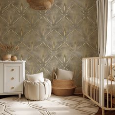 a baby's room with a crib, dresser and wallpaper in neutral tones