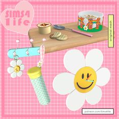 a pink background with an ice cream cone, smiley face and other items on it