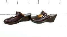 "Born brown leather mary jane wedge clog sandals/Born leather slip on mules/Born shoes/7/38 Measurements... - marked size: 7/38 - insole length: 9 3/8\" - width at ball: 3.25\" -heel: 2.5\" Features... -awesome dark brown leather...very soft and sturdy -adjustable buckle -super comfy rubber platform wedge soles -padded leather foot bed -label: Born Condition... -excellent condition -very gently worn -original box included 1N*" Mary Jane Wedges, Clog Sandals, Slip On Mules, Foot Bed, Born Shoes, Leather Mary Janes, Platform Wedge, Dark Brown Leather, Dansko Professional Clog