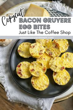 an egg muffin on a black plate with text overlay that says bacon gruyere egg bites just like the coffee shop