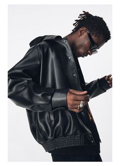 Stylish black oversized leather jacket that will match perfectly your days or nights out. Size recommendation: The model is wearing size M and his height is 70 inches/176 cm and weight 123lb/56kg. Key Characteristics: Closure Type: Single breasted Material: Faux Leather Collar: Turn-Down Collar Shipping: Guaranteed safe + secure checkout 100% money back guarantee Not sold in stores, limited quantity available Black Oversized Leather Jacket, Oversized Leather Jacket, 90s Y2k Fashion, Jacket Collection, Pu Leather Jacket, Jumpsuit Men, Streetwear Clothing, Turndown Collar, Crop Top Sweater