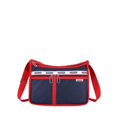 LeSportsac - Handbags - USA Deluxe Everyday Bag - USA Blue/Red Sporty Blue Shoulder Bag With Pockets, Functional Blue Bag With Zipper Closure, Blue Everyday Bag With Ykk Zipper, Functional Navy Bag With Zipper Pocket, Blue Shoulder Bag With Functional Pockets, Navy Nylon Bags With Zipper Closure, Navy Sporty Bag With Zipper Closure, Sporty Navy Bag With Zipper Closure, Functional Navy Shoulder Bag With Zipper