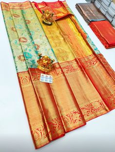 "The saree is made of pure silk kanjeevaram/kanchipattu with gold zari, Pallu, and blouse. Various Colours Available, please see photos. Mention desired colour in \"Optional Note\" when purchasing saree. ❗️❗️❗️PLEASE CONTACT SELLER TO CONFIRM COLOUR COMBINATION FOR AVAILABILITY ️❗️❗️ Upon request: Tussels, fall and pico and blouse work (Aari work and Maggam work) will be done with extra charges  Excellent quality with beautiful colours and combinations." Gold Saree With Temple Jewelry For Diwali, Gold Temple Jewelry Saree For Diwali, Gold Tilla Saree For Festivals, Ceremonial Gold Tussar Silk Traditional Wear, Ceremonial Banarasi Silk Dupatta With Tilla, Multicolor Banarasi Silk Dupatta With Tilla, Ceremonial Banarasi Silk Traditional Wear With Tilla, Ceremonial Art Silk Saree With Tilla, Gold Saree With Tilla For Navratri