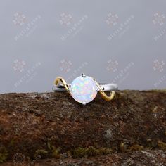 RING DETAILS Main stone: 1.0ct Lab created opal Shape: round cut, 6.5mm Band width: 1.8mm Metal: 925 Sterling Silver / Gold / Platinum(All white) Custom Service: Custom service is available, Please Let me know the style of ring you want and your requirements, and I will design a unique ring for you after communicating with you. Production and Shipping Time: Generally speaking, it takes about 2 -3 weeks to make the ring, and I will arrange shipment immediately after the ring is made. Logistics ti White Opal Birthstone Promise Ring, White Birthstone Round Ring, White Opal Birthstone Ring With Round Band, White Opal Ring With Birthstone, White Opal Birthstone Ring For Promise, White Round Birthstone Ring For Promise, White Round Birthstone Promise Ring, White Opal Birthstone Ring, White Birthstone Ring