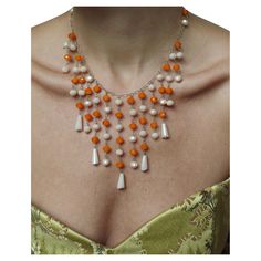 This gorgeous crystal waterfall necklace was crafted from fine Czech crystal in 1950s. The crystals are beautifully faceted, in orange and a milky ivory hue, on a silver chain— the color combination is so unique; I've never seen one quite like it and I'm not sure I will again! The waterfall of drops cascades across the décolletage for an outfit-defining moment. Closes with a spring clasp, and it can attach to any link, so the length is very adjustable, about 16" to 18.5"; drop at longest point i Waterfall Necklace, The Crystals, Czech Crystal, Color Combination, New Vintage, Vintage 1950s, Color Combinations, Silver Chain, Beaded Necklace