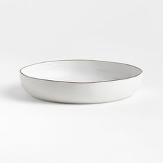 an empty white bowl on a white background