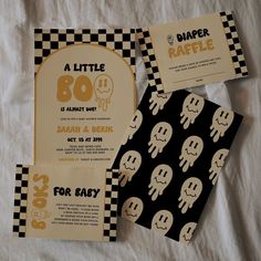 an image of baby shower party with black and white checkerboard paper on the bed