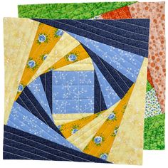 three quilts are stacked on top of each other, one has blue and yellow squares