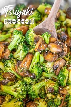 broccoli and mushrooms stir fry in a pan with a wooden spoon