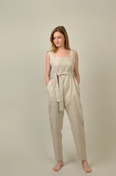 "Perfect for all shapes. Summer clothes. The back is loosely fastened. The belt comes off. Tapering in the legs. Overalls with side pockets. Model wears size S/ 172 cm/5'7\" tall. Made from OEKO - TEX Standard 100 certified European linen fabric which guarantees you that it meets human - ecological standards/ 205 g/m2 GARMENTS ARE DESIGNED FOR 164-176 CM HEIGHT ( 5'5\"-5'9\") PLEASE LEAVE A NOTE WITH YOUR ORDER, IF YOUR HEIGHT DOES NOT FALL IN THIS RANGE. Body measurements: in cm / inch XXS bust: 79-82 cm (30-32\") waist: 62-64 cm (24\"-25\") hips: 84-88 cm (33\"-34\") XS bust: 84-88 cm (33\"-34\") waist: 64-68 cm (25\"-26\") hips: 86-92 cm (33\"-36\") S bust: 88-92 cm (34\"-36\") waist: 68-72cm (26\"-28\") hips: 90-96 cm (35\"-37\") M bust: 92-96 cm (36\"-38\") waist: 72-76 cm (28\"-30\") Fashion Jumpsuits, Red Ruffle Dress, Linen Overalls, Womens Jumpsuits, Blue Jumpsuit, Red Dress Women, Linen Shirt Dress, Jumpsuit Summer, Linen Jumpsuit