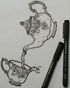 a drawing of a teapot with flowers on it and a pen next to it