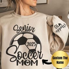 Introducing our Senior Soccer Crewneck - a perfect blend of comfort and style, personalized just for you! This unisex heavy blend crewneck sweatshirt is crafted from 50% cotton and 50% polyester (8.0 oz/yd²) for ultimate comfort and warmth during colder months. The classic fit and crew neckline ensure a clean-cut look. Our crewneck is designed for durability with double-needle stitching at key seams and a ribbed knit collar that retains its shape. The gray, pearlized tear-away label ensures irri Soccer Crewneck, Soccer Centerpieces, Soccer Senior Night, Senior Night Gifts, Soccer Mom Shirt, Mama Sweater, Class Of 2025, Volleyball Gifts, Volleyball Mom