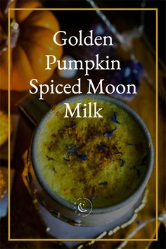 golden pumpkin spiced moon milk in a white cup