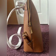 This Listing Is For A Nwt Leather Backpack By Michael Kors. It’s In The Color “Luggage” And Has Gold Hardware, Zippers And Logo. This Bag Had Never Been Used And Still Has The Foam Wrapping On The Backpack Straps. The Bag Pictured Is The Exact Bag Being Shipped Out. It Didn’t Come With A Dust Bag Nor Is In Its Original Box. It Is 100% Authentic And Has Been Kept In A Clean, Smoke Free Environment. Please Make Sure To View And Zoom In On All Photos To Determine The Condition Of The Bag. Sorry For Michael Kors Travel Shoulder Bag, Michael Kors Backpack With Detachable Strap For Daily Use, Leather Backpack With Gold-tone Hardware For Errands, Michael Kors Travel Bag With Adjustable Strap, Michael Kors Leather Backpack With Zipper, Rectangular Saffiano Leather Bag With Zipper, Travel Bags With Adjustable Strap In Saffiano Leather, Michael Kors Brown Backpack For On-the-go, Michael Kors Backpack With Detachable Strap For Everyday Use