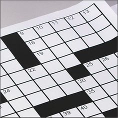 a crossword puzzle is shown in black and white, with the number twenty on it