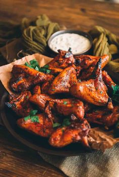 crispy smoked chicken wings on a plate with ranch dip