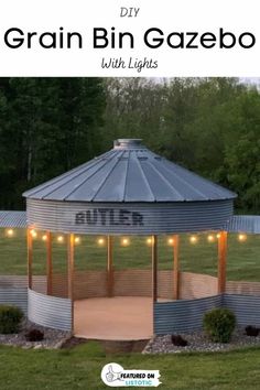 an outdoor gazebo with lights on it and the words diy grain bin gazebo