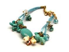 This elegant fun bracelet is going to be your favorite this spring. It is finished with gold plated lobster claw and small links. The length is 8”+ 1.5” extender. All my products come in beautiful packaging ready to be gifted. Lobster Claws, Fun Bracelet, Silk Cord, Beautiful Packaging, Lobster Claw, Turquoise Bracelet, Gold Plate, Plating, Turquoise