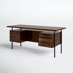 an old desk with two drawers on one side and a black metal frame on the other