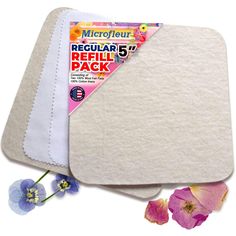 two refill pads with flowers on the side