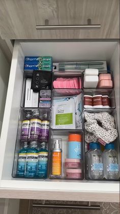 an organized drawer with various items in it