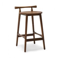 a wooden bar stool with an armrest and foot rest on the seat, against a white background