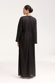 Indulge in luxury and sophistication with our Malak Embroidered Open Abaya in Black. This classic abaya with a modest silhouette is elevated by delicate embroidered detailing and a subtle texture fabric. The breezy and versatile design adds a touch of elegance to any ensemble. Elevate your wardrobe with this exclusive piece. Model is 5'7" and is wearing size XS/58". Abaya Black, White Dress Formal, Nikkah Dress, Dresses Flowy, Open Abaya, Texture Fabric, Engagement Dresses, Bamboo Silk, Dress Satin