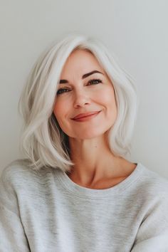 Click for More ➡️ | Save for Later ❤️A rounded bob with soft, curved edges creates a flattering shape for most face types. An opalescent white sheen adds a radiant finish. (Rounded Bob with Opalescent Sheen - Haircuts For Older Women With White Hair)