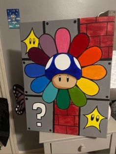 a painting on the wall with a mushroom and question mark in it's center