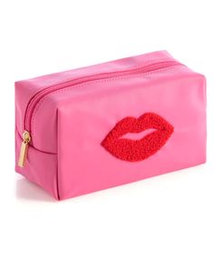 Store your odds and ends with Shiraleah’s Cara Lips Cosmetic Pouch. This pouch features an image of lips in sherpa adding texture and a fun detail to this essential pouch. Measuring L 7" × W 3" × H 4", and made from nylon, the Cara Lips Cosmetic Pouch is perfect for holding your makeup, toiletries, etc. either in a vanity drawer at home, or in another bag on the go. Pair with other items from Shiraleah colletion to complete your look! Color: Pink L 7" X W 3" X H 4" Nylon Gold Hardware Made In China Vegan 02-62-006 Vanity Drawer, Lip Patch, Essential Pouch, Hot Pink Lips, Pink Pouch, Unique Fashion Jewelry, Pink Cosmetics, Lip Cosmetics, Red Makeup