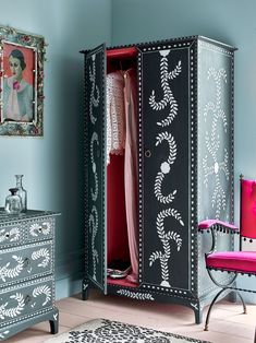 This wardrobe is painted with Chalk Paint®  in Graphite and Old White and coated with Pearlescent Glaze