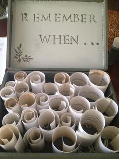 a box filled with lots of white cups