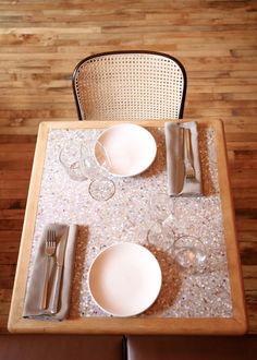 an overhead view of a table with place settings