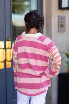 The ASTER STRIPE TEE offers a modern twist on the classic tee. Its oversized and provides a comfortable and stylish fit, while the unique design of different size stripes adds a touch of personality. Details + Fi Machine Wash cold Do Not Bleach Lay Flat To Dry Fits true to size Model is 5’7” and wearing size small Oversized Striped Tops For Streetwear, Sporty Cotton Tops With Vertical Stripes, Striped Oversized Crew Neck Top, Striped Tops For Streetwear, Oversized Striped Crew Neck Top, Sporty Tops With Striped Hem And Relaxed Fit, Sporty Relaxed Fit Top With Striped Hem, Casual Oversized Tops With Striped Sleeves, Oversized Sporty Tops With Contrast Stripes