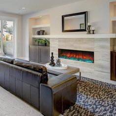 a living room with couches and a fireplace