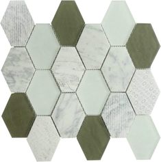 a white and green tile with hexagonal tiles