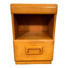 a small wooden shelf with a drawer on it's bottom and an opening at the top