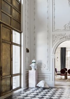 a white and black checkered floor in a room