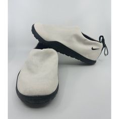 This Pair Of Nike Acg Air Moc Slip-On Moccasins Is A Must-Have For Any Man's Shoe Collection. The Summit White And Black Color Combination Makes It Versatile For Any Outfit. The Shoes Have A Zip Closure For Easy Wear And Are Made With Durable Materials Such As Polyester And Rubber Outsole. The Shoes Are Part Of The Nike Acg Product Line, Which Is Known For Its Quality And Style. The Shoes Are New Without Box But Have Never Been Worn. They Are Perfect For Outdoor Activities Or Casual Wear. Don't Nike Casual Walking Shoes With Rubber Sole, Casual Nike Walking Shoes With Rubber Sole, Nike Walking Shoes With Rubber Sole And Round Toe, White Casual Moc Toe Moccasins, Casual White Moc Toe Moccasins, Outdoor Low-top Moccasins With Rubber Sole, Casual Moccasins With Vibram Sole For Outdoor, Platforms Shoes, Nike Sandals