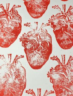 a red and white drawing of four human hearts