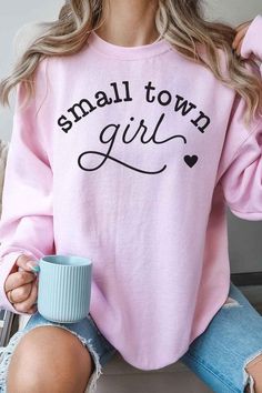 SMALL TOWN GIRL OVERSIZED GRAPHIC SWEATSHIRT The oversized sweatshirt trend has been seen on runways and street style icons alike. Made from high-quality cotton, this Small Town Girl sweatshirt is a cozy and stylish option for any wardrobe.PREMIUM COTTONOVERSIZED FIT Trendy Spring Sweatshirt For Loungewear, Trendy Spring Loungewear Sweatshirt, Trendy Fall Crew Sweatshirt, Trendy Crew Sweatshirt For Fall, Trendy Crew Neck Sweatshirt For Fall, Oversized Spring Sweatshirt, Trendy Pink Sweatshirt For Fall, Graphic Print Sweatshirt For Spring Loungewear, Trendy Pink Fall Sweatshirt