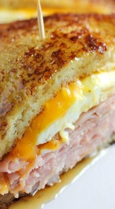 a grilled ham and cheese sandwich on a plate