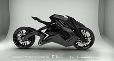 a futuristic black motorcycle is shown in this studio shot, with the light reflecting off it's front wheel