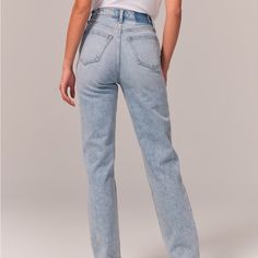 New Without Tags. Never Worn. Ultra High Rise 90s Straight Jean - 30s On-Trend 90's-Style Ultra High Rise Straight Jeans With Built-In Stretch For Superior Comfort Featuring Our Highest Rise That Sits At Your Natural Waist And Looks Great With Your Shirt Tucked Or Untucked. With Refined Details And A Vintage Feel From Top To Bottom, This Style Features A Longer-Length Inseam And Super Light Indigo Wash. Imported. Body:99% Cotton, 1% Elastane To Avoid Color Transfer, Wash Before Wear, Turn Garmen Abercromie Jeans, 90s Inspired High Rise Fitted Jeans, 90s Inspired Fitted High Rise Jeans, Fitted 90s Inspired Jeans For Spring, 90s Inspired High-rise Fitted Jeans, Abercrombie High Rise Mom Jeans, Abercrombie 90s Relaxed Jeans, Abercrombie 90s Ultra High Rise Straight Jeans, Abercrombie High Rise 90s Relaxed Jean