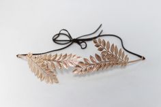 This stunning wreath/belt is based on a flexible and durable brass wire base. Its comfortable to wear since it is easily bended to the shape of the head/waste. Its adorned with four impressive olive branches- Greek style leaves. Attached at each end is a strand of faux suede (out of love and respect for animals), but the straps could be changed to cream or white satin ribbons. As a belt you can wear it with your wedding dress or you can match it to a simple tunic or a little black dress to creat Gold Leaf Crown, Simple Tunic, Ethereal Jewelry, Goddess Crown, Accessories Boho, Wire Headband, Feather Bracelet, Out Of Love, Wedding Sash Belt