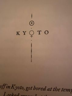 an old book with the words kyto written in black and white ink on it