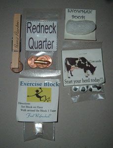 there are several different items in the package on the table, including magnets and tags