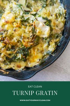 a skillet filled with spinach and cheese