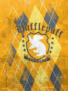 an old yellow and black wall with the hogwarts crest on it